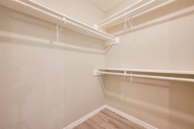 6822 Stonewater, Houston, TX 77084 - spacious closet with wood finished floors