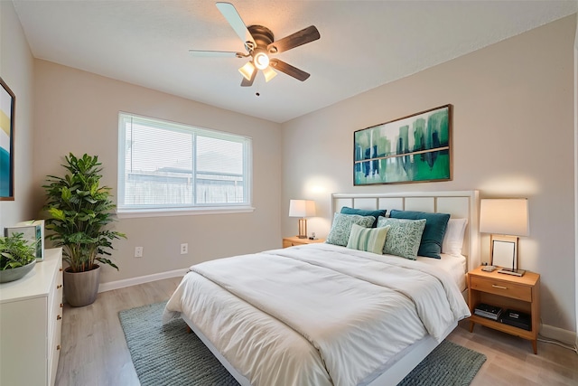 6822 Stonewater, Houston, TX 77084 - bedroom featuring light wood finished floors and ceiling fan