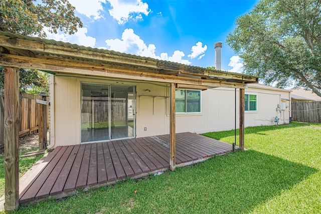 6822 Stonewater, Houston, TX 77084 - back of house featuring a fenced backyard, a deck, and a metal roof