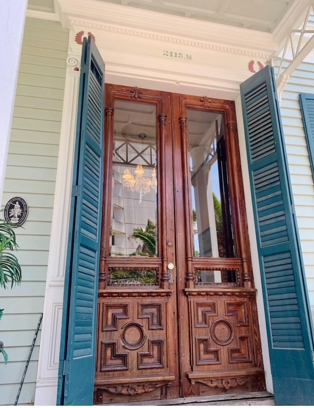 2113 Ball, Galveston, TX 77550 - property entrance with a porch