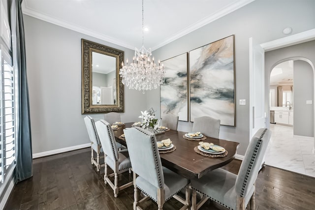 9503 Martha Springs Dr, Houston, TX 77070 - dining space featuring arched walkways, ornamental molding, a chandelier, and wood-type flooring