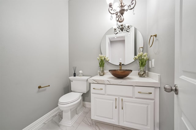 9503 Martha Springs Dr, Houston, TX 77070 - half bathroom with vanity, a chandelier, and marble finish floors