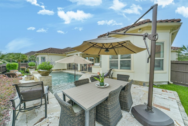 9503 Martha Springs Dr, Houston, TX 77070 - fenced backyard featuring a patio area and outdoor dining space