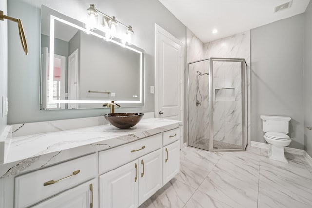 9503 Martha Springs Dr, Houston, TX 77070 - bathroom with marble finish flooring, vanity, a marble finish shower, and recessed lighting