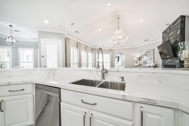 9503 Martha Springs Dr, Houston, TX 77070 - kitchen with dishwasher, crown molding, a chandelier, white cabinets, and recessed lighting