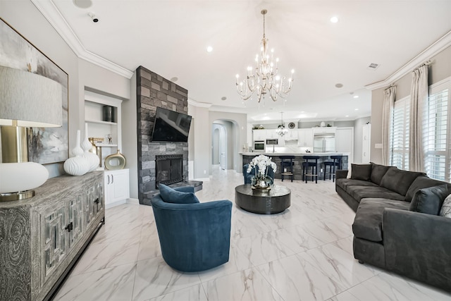 9503 Martha Springs Dr, Houston, TX 77070 - living room featuring ornamental molding, a chandelier, built in shelves, a stone fireplace, and light marble finish flooring