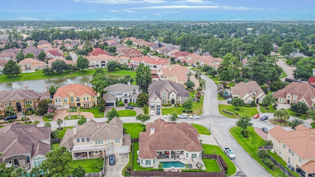9503 Martha Springs Dr, Houston, TX 77070 - aerial perspective of suburban area featuring a nearby body of water