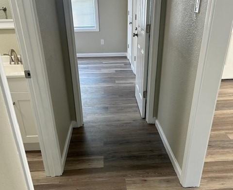 2308 13th Ave N, Texas City, TX 77590 - hallway featuring wood finished floors