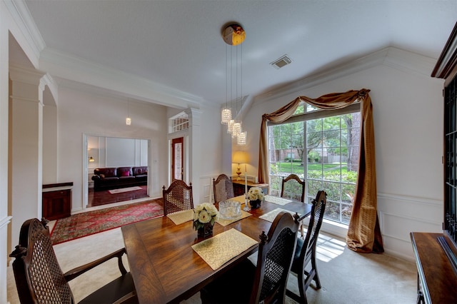 3910 Sand Myrtle Dr, Houston, TX 77059 - dining space with crown molding, carpet, decorative columns, and a chandelier