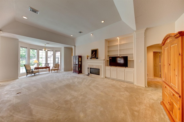 3910 Sand Myrtle Dr, Houston, TX 77059 - unfurnished living room with built in features, light carpet, recessed lighting, a fireplace with flush hearth, and ceiling fan