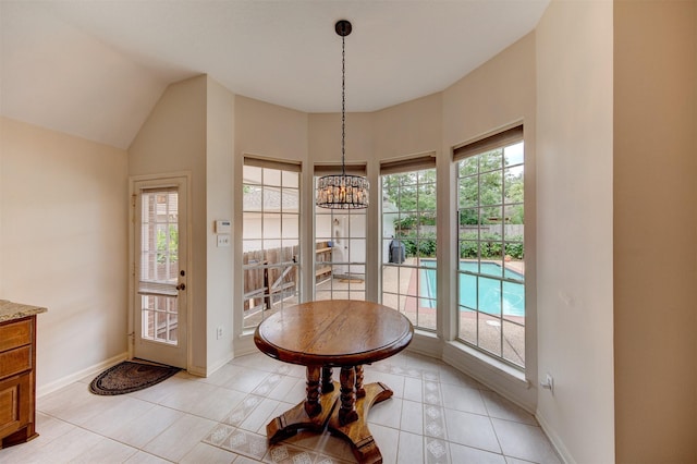 3910 Sand Myrtle Dr, Houston, TX 77059 - dining space featuring a chandelier and light tile patterned flooring