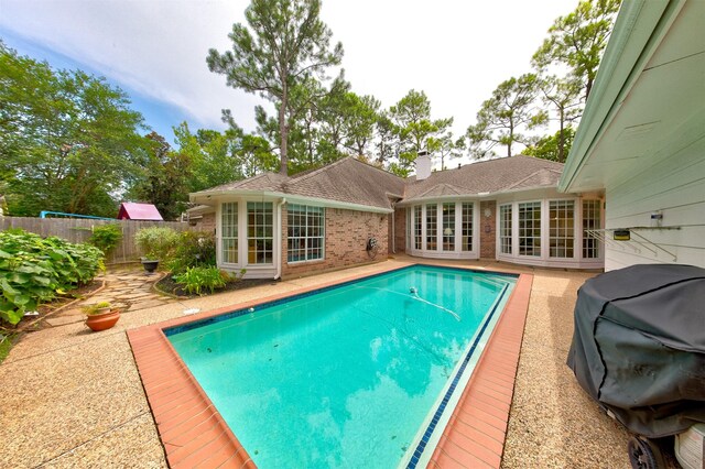 3910 Sand Myrtle Dr, Houston, TX 77059 - view of pool with a patio area and grilling area
