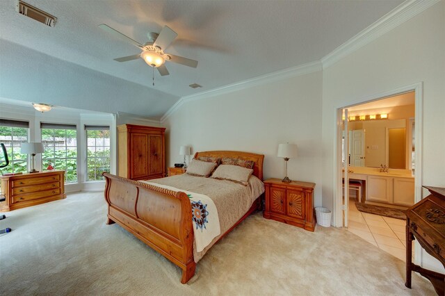3910 Sand Myrtle Dr, Houston, TX 77059 - bedroom with crown molding, light colored carpet, lofted ceiling, connected bathroom, and ceiling fan