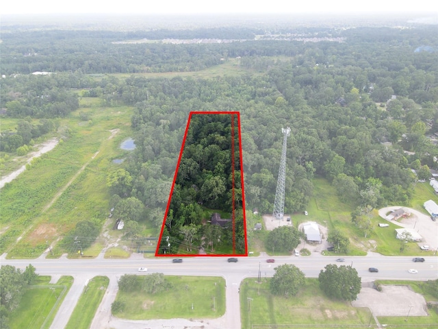 26334 Fm 2090th Rd, Splendora, TX 77372 - aerial view of property's location with a forest and property boundaries highlighted