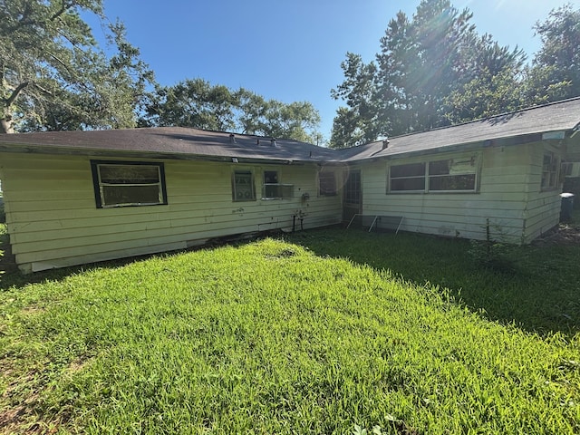 26334 Fm 2090th Rd, Splendora, TX 77372 - rear view of property with a yard