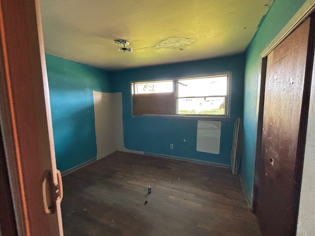 26334 Fm 2090th Rd, Splendora, TX 77372 - unfurnished room with wood finished floors and baseboards