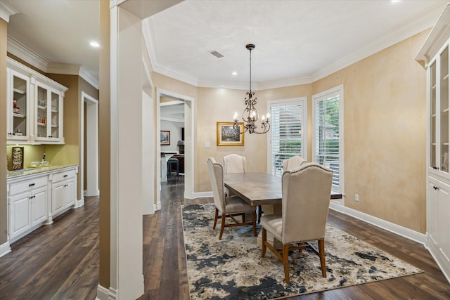 59 N Berryline Cir, Spring, TX 77381 - dining space with dark wood-style flooring, ornamental molding, a chandelier, and recessed lighting