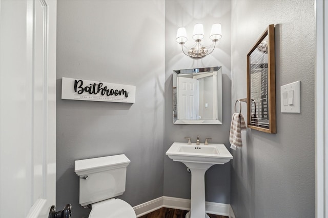 59 N Berryline Cir, Spring, TX 77381 - bathroom with a chandelier and wood finished floors