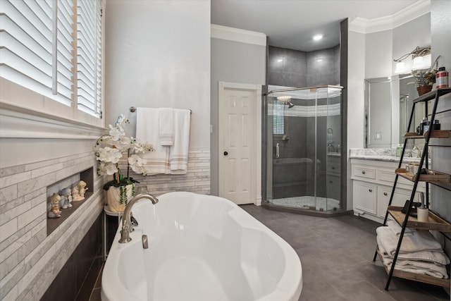59 N Berryline Cir, Spring, TX 77381 - bathroom featuring a tub to relax in, vanity, a shower stall, and crown molding