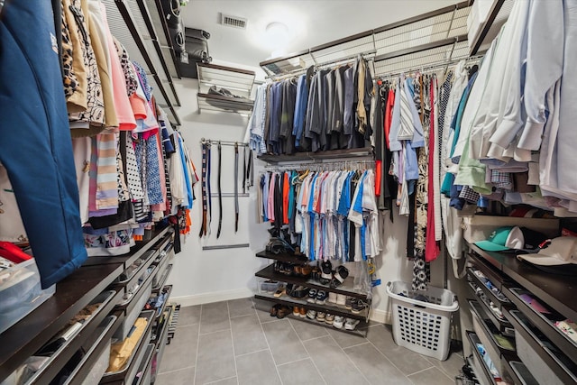 59 N Berryline Cir, Spring, TX 77381 - spacious closet featuring tile patterned flooring