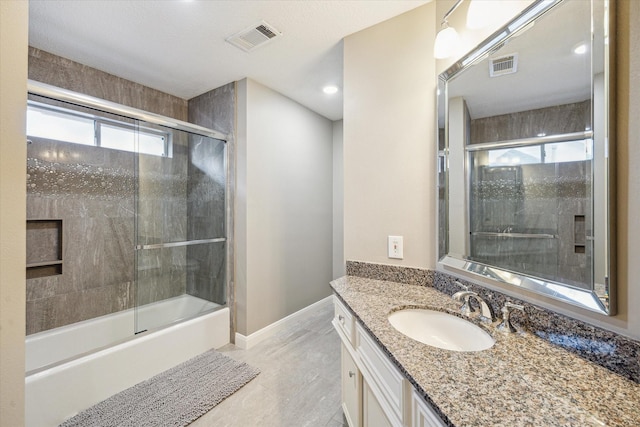 59 N Berryline Cir, Spring, TX 77381 - bathroom with vanity and enclosed tub / shower combo
