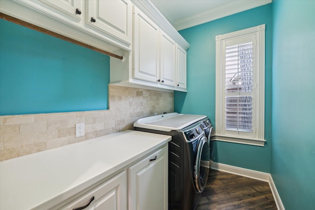 59 N Berryline Cir, Spring, TX 77381 - laundry area with washing machine and dryer, cabinet space, dark wood finished floors, and crown molding