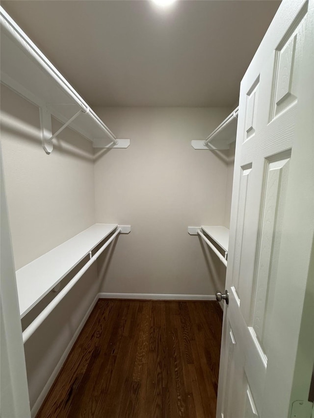 6202 Simsdale St, Houston, TX 77087 - walk in closet featuring dark wood-type flooring