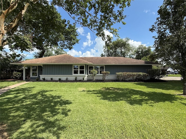 6202 Simsdale St, Houston, TX 77087 - ranch-style home featuring a front lawn, brick siding, and roof with shingles
