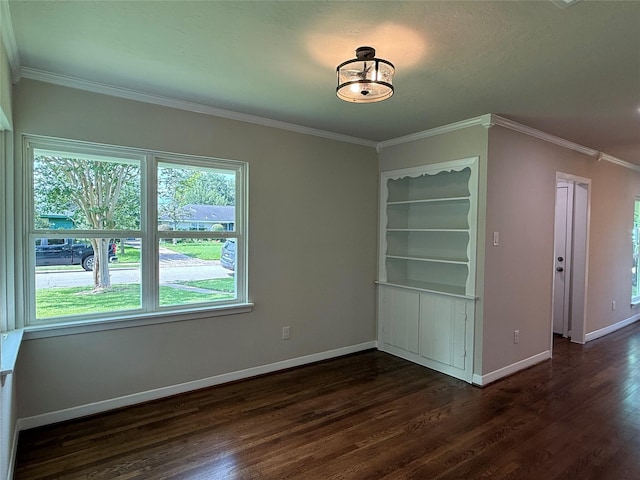 6202 Simsdale St, Houston, TX 77087 - unfurnished dining area with dark wood-style flooring, ornamental molding, and built in shelves