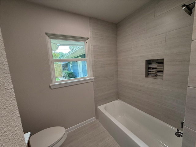 6202 Simsdale St, Houston, TX 77087 - bathroom featuring toilet and tub / shower combination