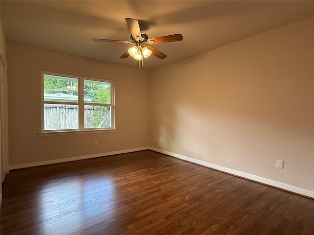 6202 Simsdale St, Houston, TX 77087 - spare room featuring a ceiling fan and dark wood-style floors