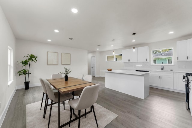 200 Burnett Dr, Baytown, TX 77520 - dining space featuring recessed lighting and light wood finished floors