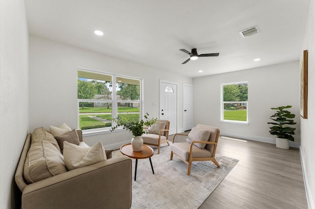 200 Burnett Dr, Baytown, TX 77520 - living room with ceiling fan, light wood-style flooring, and recessed lighting