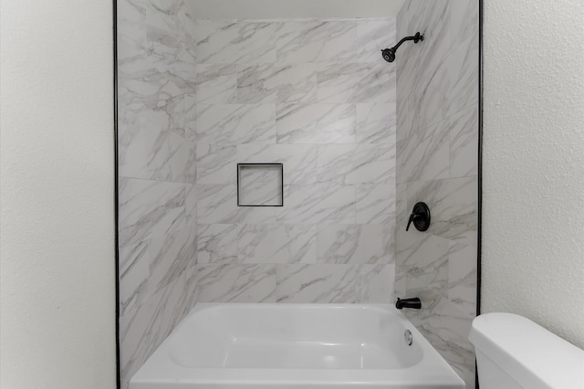 200 Burnett Dr, Baytown, TX 77520 - full bath featuring shower / tub combination and a textured wall