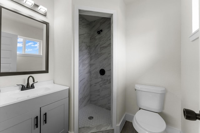 200 Burnett Dr, Baytown, TX 77520 - bathroom with vanity and a tile shower