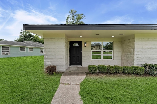 200 Burnett Dr, Baytown, TX 77520 - property entrance featuring a yard and cooling unit