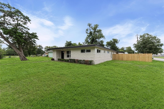 200 Burnett Dr, Baytown, TX 77520 - rear view of property with stone siding