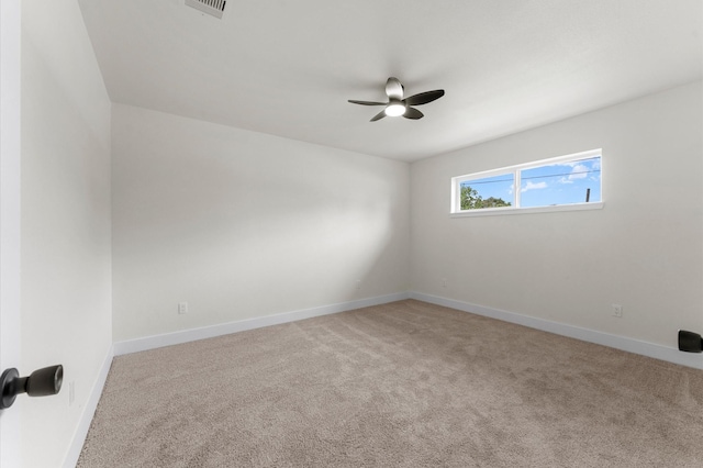 200 Burnett Dr, Baytown, TX 77520 - empty room featuring carpet floors and a ceiling fan