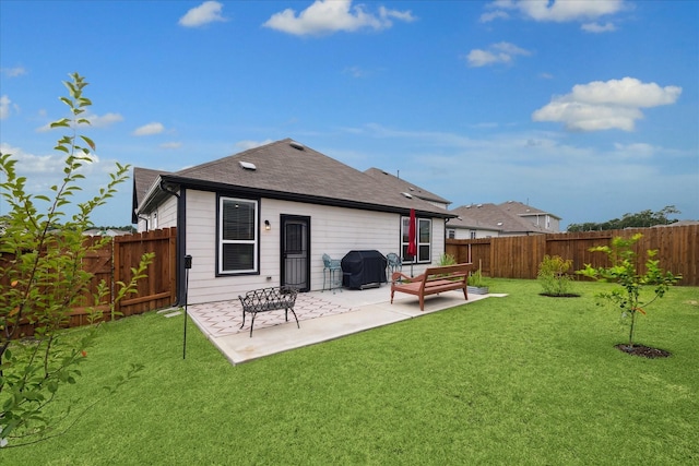 23502 Glenbuck St, Spring, TX 77373 - back of property with a patio, a fenced backyard, and a shingled roof