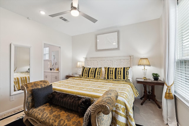 23502 Glenbuck St, Spring, TX 77373 - bedroom with light carpet, ensuite bathroom, and ceiling fan
