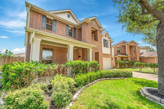 18203 Park Sage Ct, Cypress, TX 77433 - traditional-style home featuring brick siding, a garage, driveway, and a porch