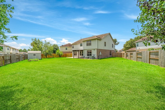 18203 Park Sage Ct, Cypress, TX 77433 - back of property with a shed, a fenced backyard, and brick siding