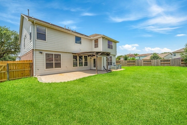 18203 Park Sage Ct, Cypress, TX 77433 - back of property featuring a patio area and a fenced backyard