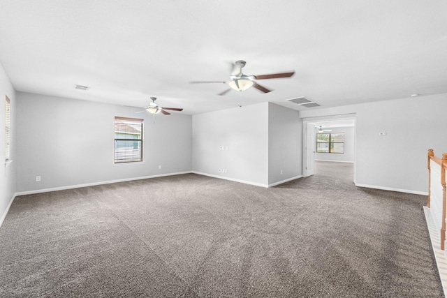 18203 Park Sage Ct, Cypress, TX 77433 - carpeted empty room featuring plenty of natural light and ceiling fan