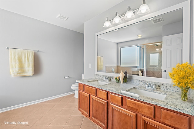 18203 Park Sage Ct, Cypress, TX 77433 - bathroom with double vanity, a stall shower, and tile patterned flooring