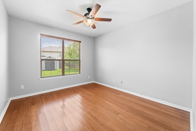 18203 Park Sage Ct, Cypress, TX 77433 - empty room with ceiling fan and wood finished floors