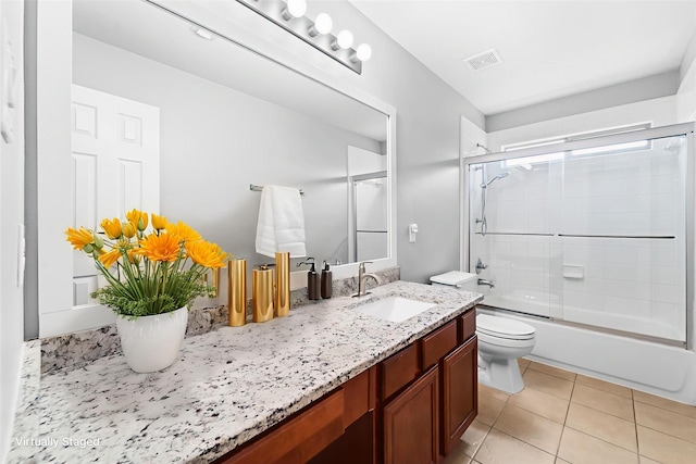 18203 Park Sage Ct, Cypress, TX 77433 - bathroom with vanity, bath / shower combo with glass door, and tile patterned floors