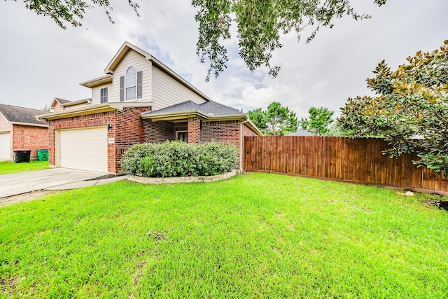 10627 Fire Sage Dr, Humble, TX 77396 - view of front of property featuring brick siding, driveway, and an attached garage