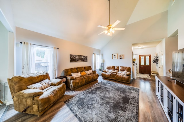 10627 Fire Sage Dr, Humble, TX 77396 - living room featuring high vaulted ceiling, dark wood-type flooring, and a ceiling fan