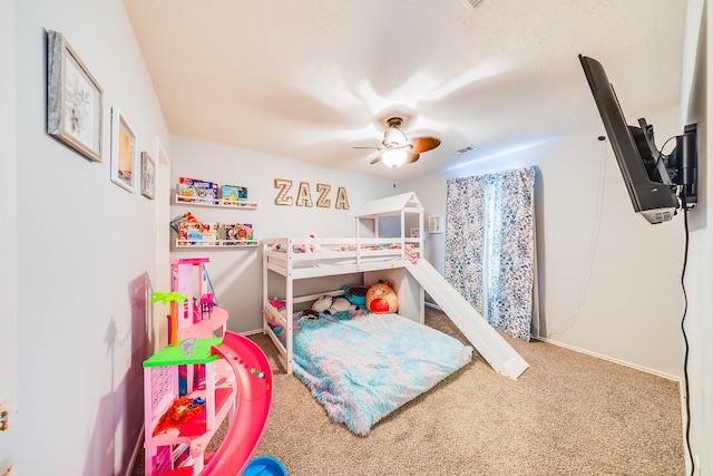 10627 Fire Sage Dr, Humble, TX 77396 - carpeted bedroom featuring a ceiling fan and baseboards